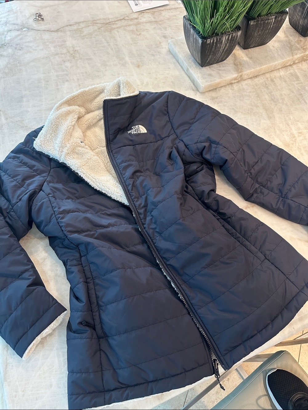 The North Face Women’s Navy Puffer Jacket with Cream Sherpa Lining 2-in 1 revers